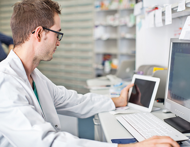 young-male-pharmacist-computer-summary.jpg