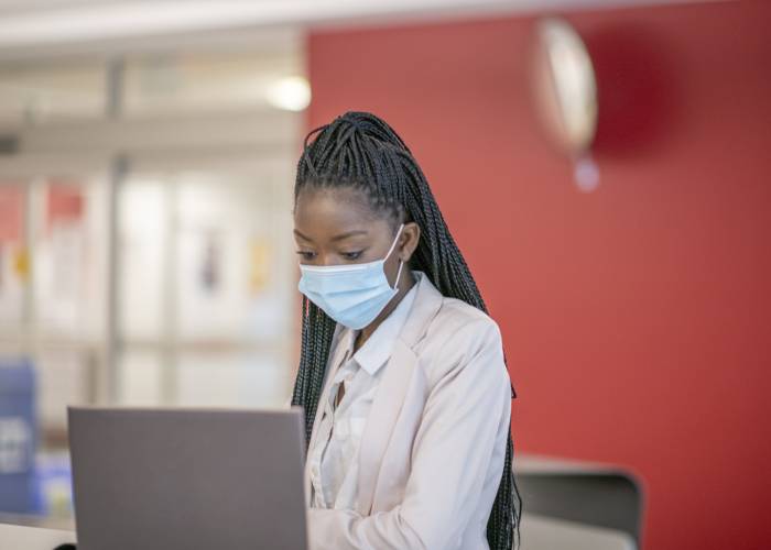 student laptop mask covid-19 black woman.jpg
